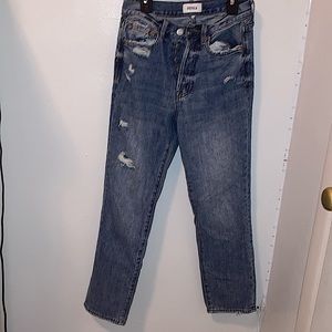Lightly ripped women’s ankle jeans